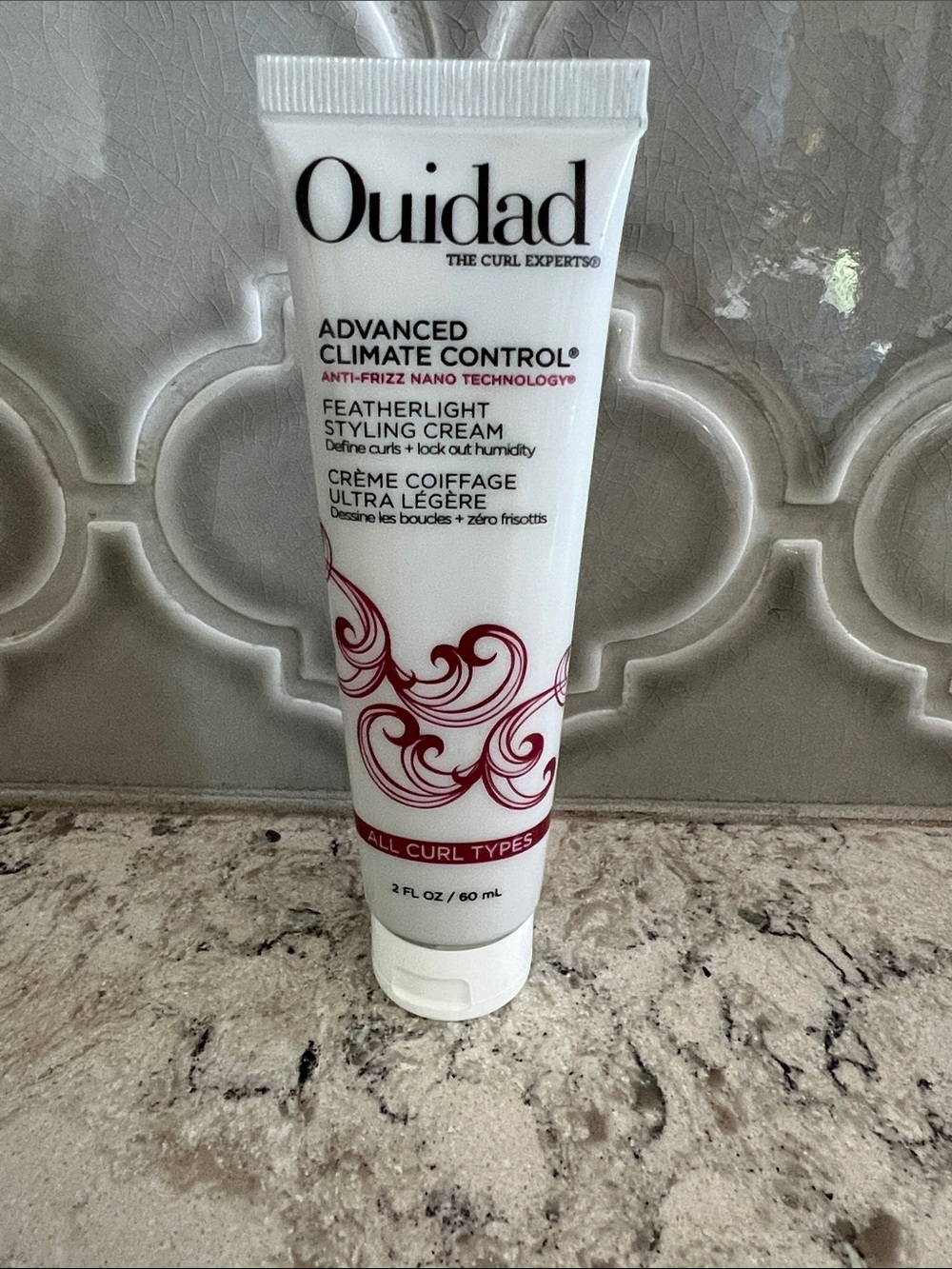4/$14 Ouidad Advanced Climate Control Featherlight Styling Cream, travel size